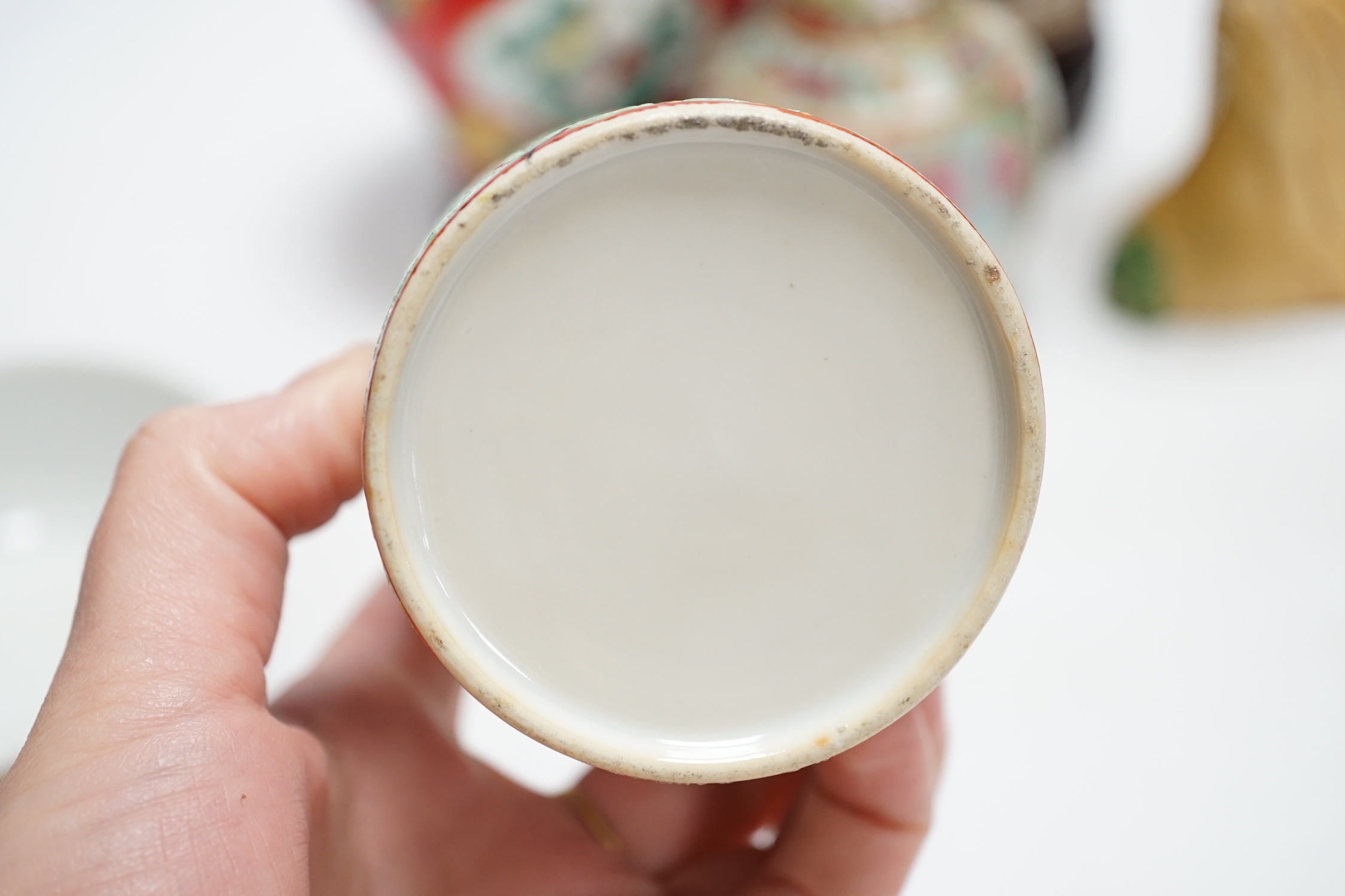 A group of Chinese ceramics 18th century and later, including a bottle vase, a water pipe vessel, box and cover, three bowls, a Tang style figure of a lady, a Yixing teapot, together with a resin figure of an emperor